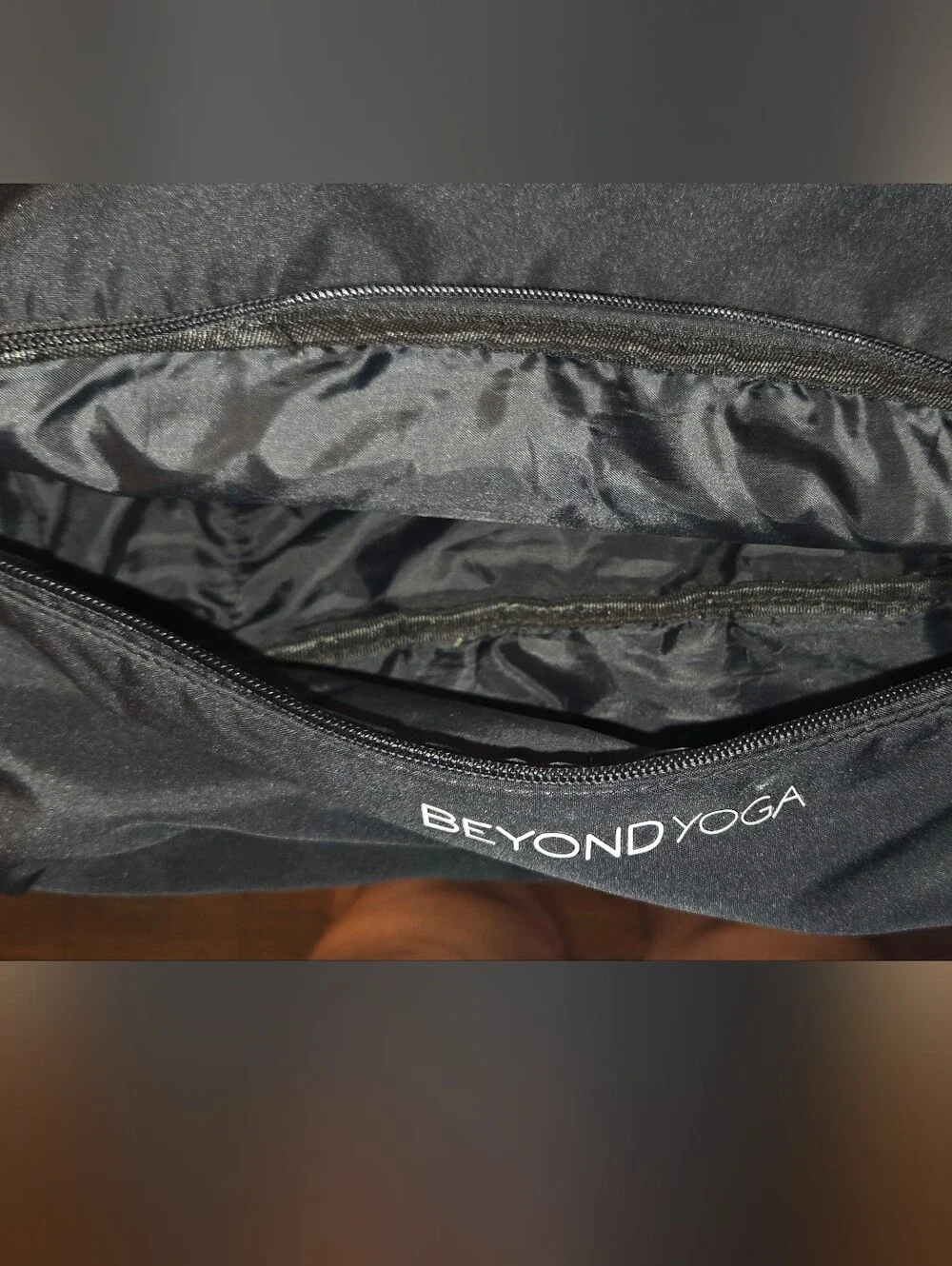 Beyond Yoga Black Drawstring Women’s Backpack with Lower Zip Pocket
